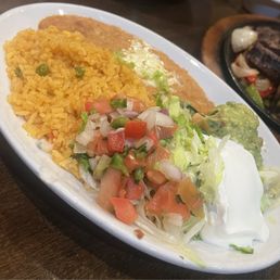 Refried Beans, Mexican Rice, Guacamole, Pico de gallo, Sour Creme
