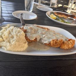 I got the Chicken fried chicken w/mashed potatoes and gravy, and my wife got the salmon dish. Both were incredible!