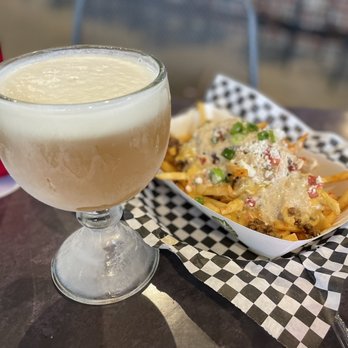 Rogers Roundhouse - a plate of fries and a glass of milk - Beer Gardens Near Me - Fort Worth, Texas