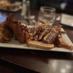 Grace O'Malley's Irish Pub & Restaurant - Fish and chips with poutine fries