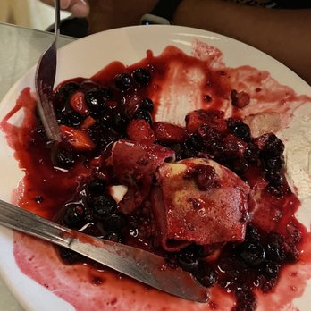Crepes de Paris - You can see how much of the mixed berries mixture there was. My crepe got so soggy so fast. - Creperies Near Me - Claremont, California