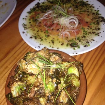 Barceloneta - Brussel sprouts with bacon and the Wahoo dish w diced olives in a vinaigrette. Delicious! - Spanish Near Me - Miami Beach, Florida