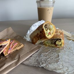 Breakfast burrito, veggie style, added sausage and avocado along with their homemade strawberry pop tart