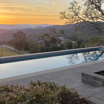 Carecraft Pools - a view of a pool at sunset - General Contractors Near Me - San Luis Obispo, California Carecraft Pools - a view of a pool at sunset - General Contractors Near Me - San Luis Obispo, California