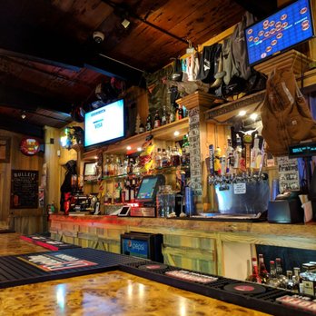 The Rawhide Saloon - a bar with a wooden bar top - Bars Near Me - Jamestown, California