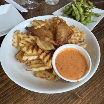 Thaicoon Restaurant & Pub - Bangkok Bay Battered Bites (fish) with Waffle Fries - Thai Near Me - Pearland, Texas Thaicoon Restaurant & Pub - Bangkok Bay Battered Bites (fish) with Waffle Fries - Thai Near Me - Pearland, Texas