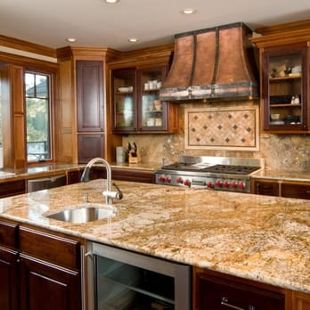 Natural Stone Fabricators - a kitchen with granite countertops - General Contractors Near Me - Anaheim, California Natural Stone Fabricators - a kitchen with granite countertops - General Contractors Near Me - Anaheim, California