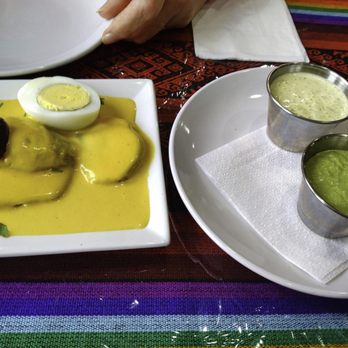 Mi Sabor Peruano - Appetizer_Papa a La Huancaina-sliced potatoes with light cheese sauce+2 side sauces - Peruvian Near Me - Joppatowne, Maryland Mi Sabor Peruano - Appetizer_Papa a La Huancaina-sliced potatoes with light cheese sauce+2 side sauces - Peruvian Near Me - Joppatowne, Maryland