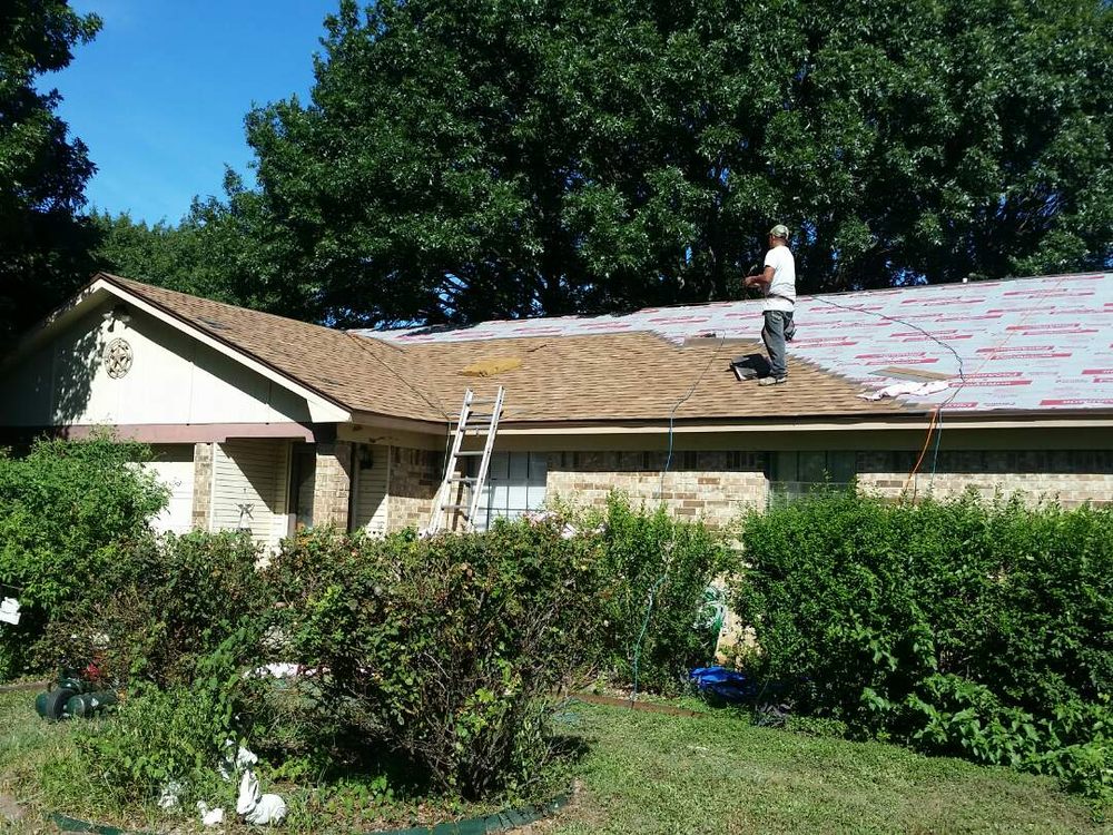 Slide of Compass Roofing
