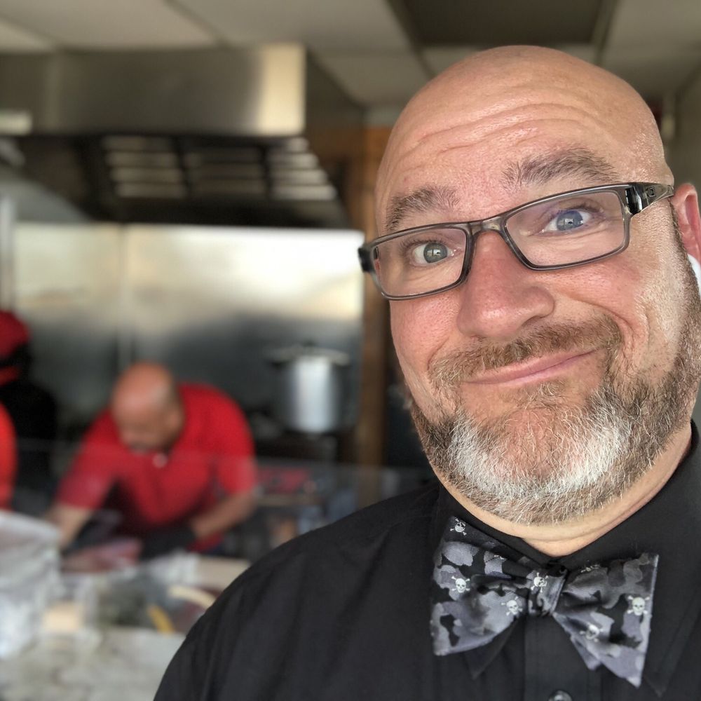 Me ordering inside and watching them prepare the entrees. Me ordering inside and watching them prepare the entrees.