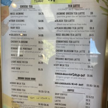 Debutea - Brooklyn - Menu - A menu board displaying a selection of teas, poke bowls, and toppings at a Brooklyn business, with prices and descriptions for each item. - Poke Near Me - Brooklyn, New York