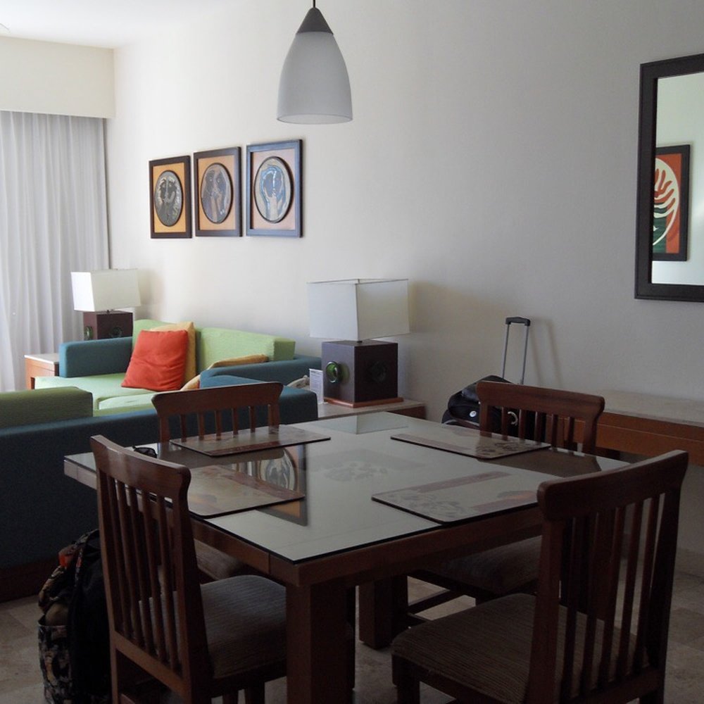 Mayan Palace - Table and living room - Hotels Near Me - Playa del Carmen, ROO