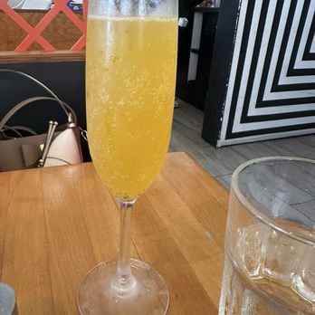 Tostado - Passion Fruit Mimosa - Breakfast & Brunch Near Me - San Juan, Puerto Rico Tostado - Passion Fruit Mimosa - Breakfast & Brunch Near Me - San Juan, Puerto Rico