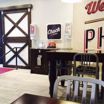 Cleavers - Condiment and napkin area upstairs with seating - Cheesesteaks Near Me - Philadelphia, Pennsylvania