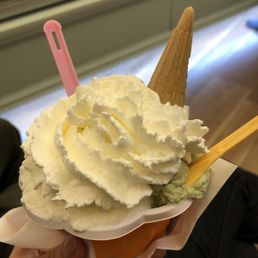 3 flavors: pistachio, chestnut, and coconut with whipped cream and a cone 3 flavors: pistachio, chestnut, and coconut with whipped cream and a cone