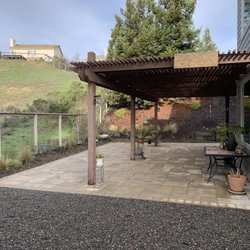 O'Neal Masonry - AFTER: Large beautiful patio of pavers and all grass removed for extra gravel area.