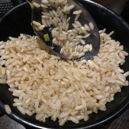 The rice wasn't fully cooked.