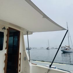 Gray Canvasworks - Custom Sunbrella aft awning for a Bruckmann 36.6.