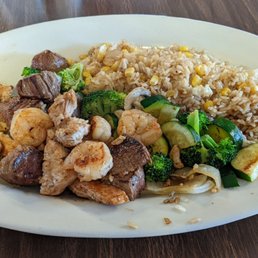 Hibachi Grill with chicken, steak, shrimp and very little soy sauce. Hibachi Grill with chicken, steak, shrimp and very little soy sauce.