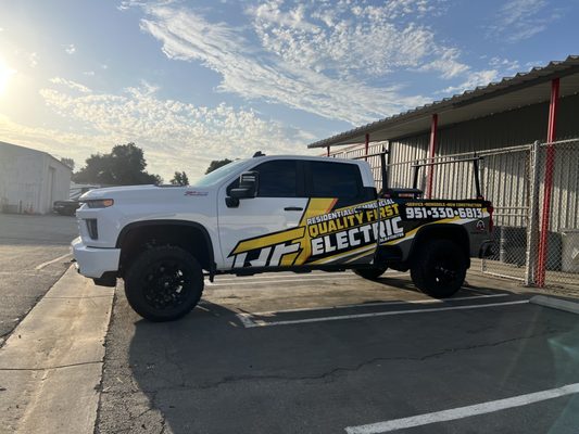 Quality First Electric Logo