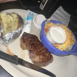 Dock of the Bay - Steak, baked potato and salad. It was a Saturday night and they had steak for a special.