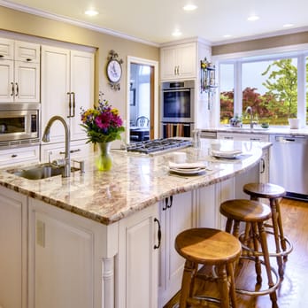 Your Total Renovation - Light, bright kitchen remodel featuring quality cabinets, stunning granite and tile, stainless appliances and refinished floors. - General Contractors Near Me Your Total Renovation - Light, bright kitchen remodel featuring quality cabinets, stunning granite and tile, stainless appliances and refinished floors. - General Contractors Near Me