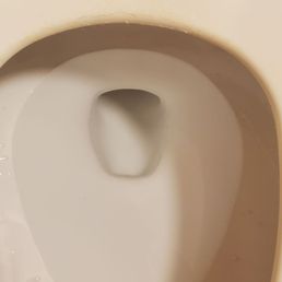 Peeling toilet seat. Peeling toilet seat.