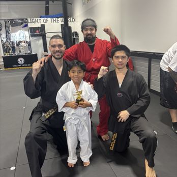 Hana Taekwondo - Master Mathew and leaders Noah & JT posing after testing! - Taekwondo Near Me - Fallbrook, California
