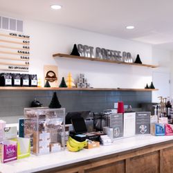 SGT Coffee - Front coffee bar at SGT Coffee Co. inside The Well, featuring our espresso setup and retail offerings.