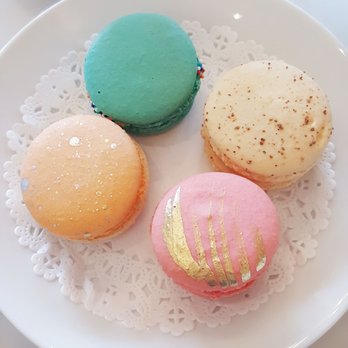 Le Bon Macaron - Clockwise from top: Marie Antoinette cake batter, eggnog, rose raspberry, mimosa. - Coffee & Tea Near Me - Ann Arbor, Michigan Le Bon Macaron - Clockwise from top: Marie Antoinette cake batter, eggnog, rose raspberry, mimosa. - Coffee & Tea Near Me - Ann Arbor, Michigan