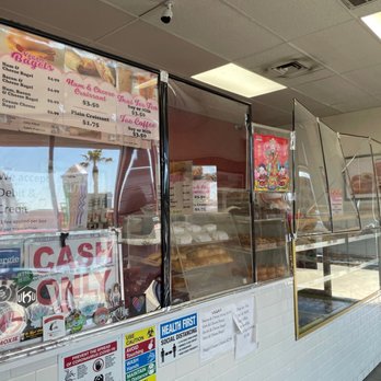 Ronald's Donuts - Sign says CASH Only but they do take credit/debit but charge a small fee. - Donuts Near Me - Las Vegas, Nevada