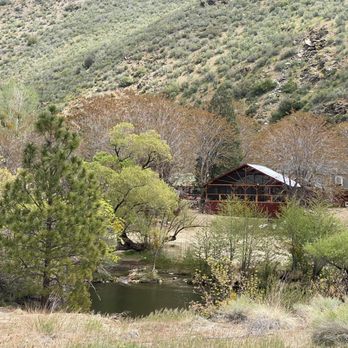 Johnny McNally’s Fairview Lodge - The patio dining area of the Lodge as seen across the river - American Near Me - Kernville, California