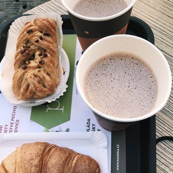 Paneria - croissant, pecan pastry, and hot chocolates. You can see that one cup has significantly less serving than the other.... not cool :( - Bakeries Near Me - Prague, Puerto Rico Paneria - croissant, pecan pastry, and hot chocolates. You can see that one cup has significantly less serving than the other.... not cool :( - Bakeries Near Me - Prague, Puerto Rico