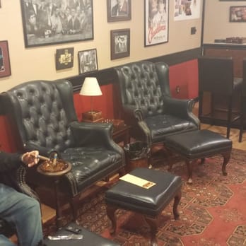 Goodfellas Cigars - a man sitting in a waiting room - Cigar Bars Near Me - Medford, New York Goodfellas Cigars - a man sitting in a waiting room - Cigar Bars Near Me - Medford, New York