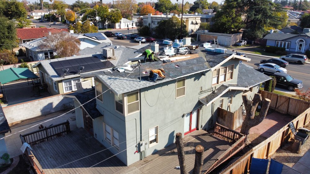 Slide of JAG Roofing