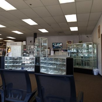 Miami Optical - Comfy chairs in sitting area. - Eyewear & Opticians Near Me - Chicago, Illinois Miami Optical - Comfy chairs in sitting area. - Eyewear & Opticians Near Me - Chicago, Illinois