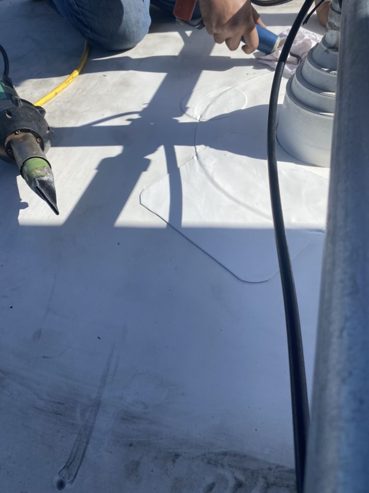 Slide of Tip Top Roofing