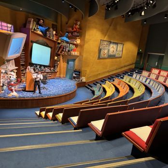Animation Academy - Animation Academy auditorium with artist waiting on stage - Art Classes Near Me - Anaheim, California Animation Academy - Animation Academy auditorium with artist waiting on stage - Art Classes Near Me - Anaheim, California