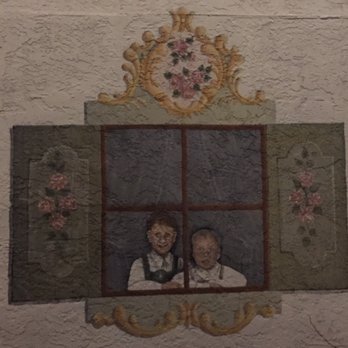 Linderhof Inn - Parking has pretty painted windows on the side of the hotel. - Hotels Near Me - Leavenworth, Washington Linderhof Inn - Parking has pretty painted windows on the side of the hotel. - Hotels Near Me - Leavenworth, Washington
