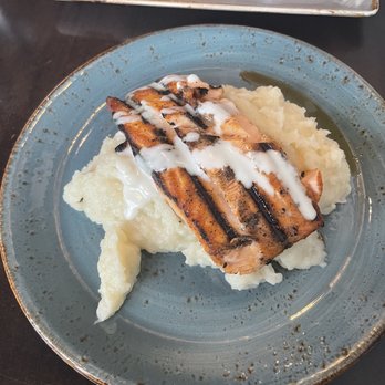 Riverstone Corner Bistro - Grilled salmon with garlic cream sauce and mash potatoes - Comfort Food Near Me - Canton, Georgia Riverstone Corner Bistro - Grilled salmon with garlic cream sauce and mash potatoes - Comfort Food Near Me - Canton, Georgia