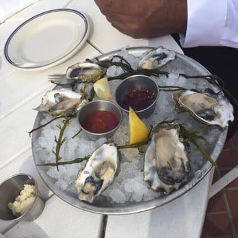 Harbor House - Oyster platter and everything else dumped at the edge of the table by server~Annoyed customer - Seafood Near Me - Milwaukee, Wisconsin