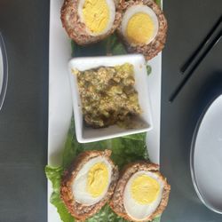 The Refinery - The sausage and egg appetizer was delicious.