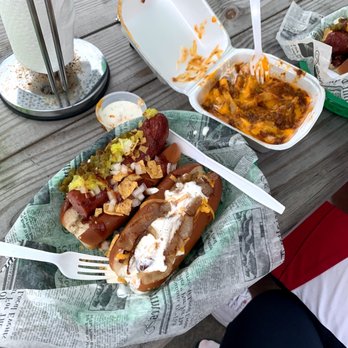 Fenway Grille - otdogs and sides on a picnic table - American Near Me - North Myrtle Beach, South Carolina Fenway Grille - otdogs and sides on a picnic table - American Near Me - North Myrtle Beach, South Carolina