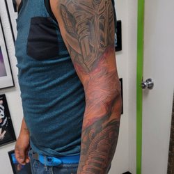 Psycho Clown Tattoo - Sleeve tattoo done recently by artist/owner Jarrod text 6823651277 for booking availability.