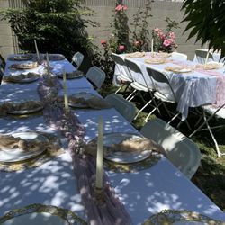 DLB Party Rentals - Rented 7' tables and white foldable chairs
