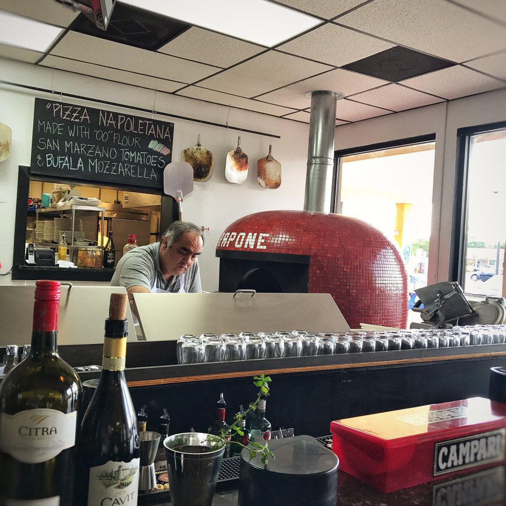 Rapone Brick Oven - The owner (Mr. Rapone...I am guessing) making our pizzas. Nice guy - Pizza Near Me - North Myrtle Beach, South Carolina Rapone Brick Oven - The owner (Mr. Rapone...I am guessing) making our pizzas. Nice guy - Pizza Near Me - North Myrtle Beach, South Carolina