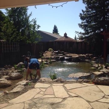 Buck's Landscape Materials - One of the amazing Buck's guys working on setting those plants just right for me! - Home & Garden Near Me - Bakersfield, California