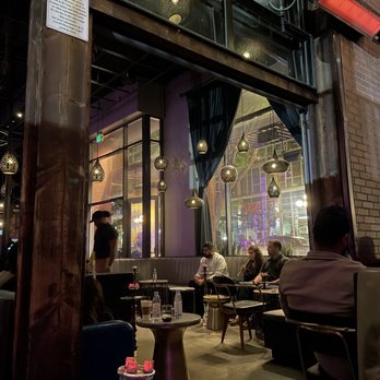 Mina Lounge - people sitting at tables in a restaurant - Hookah Bars Near Me - San Diego, California Mina Lounge - people sitting at tables in a restaurant - Hookah Bars Near Me - San Diego, California