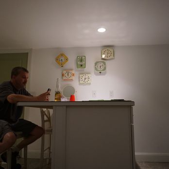 Superior Rentals - Carriage house kitchen featuring a clock them - Vacation Rental Agents Near Me Superior Rentals - Carriage house kitchen featuring a clock them - Vacation Rental Agents Near Me