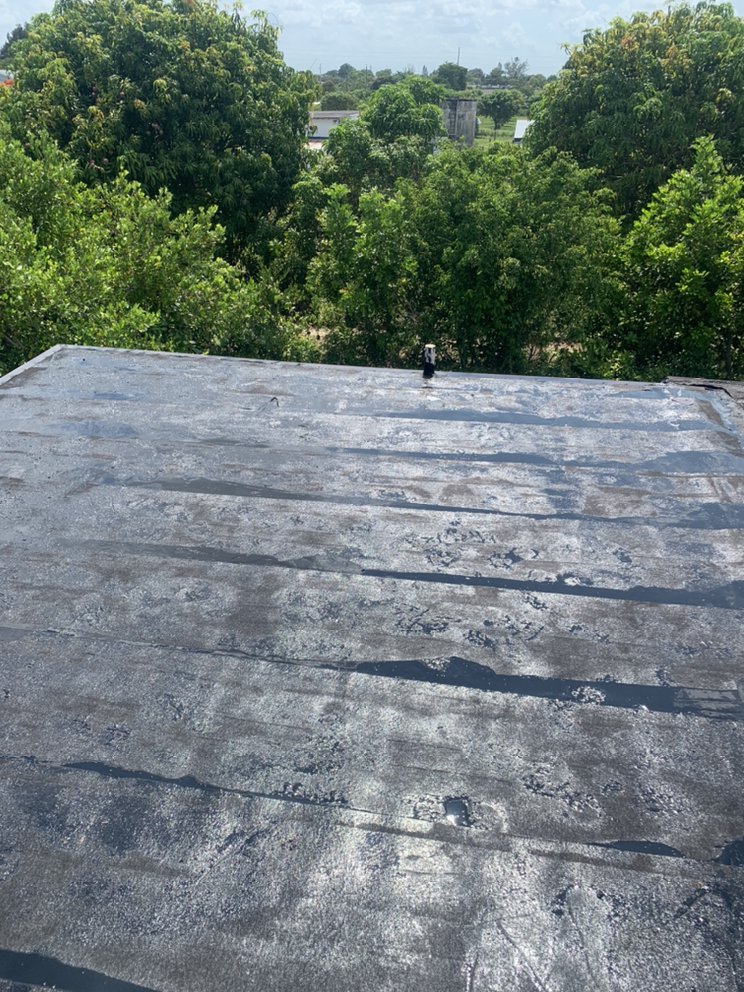 Slide of Louis Roofing